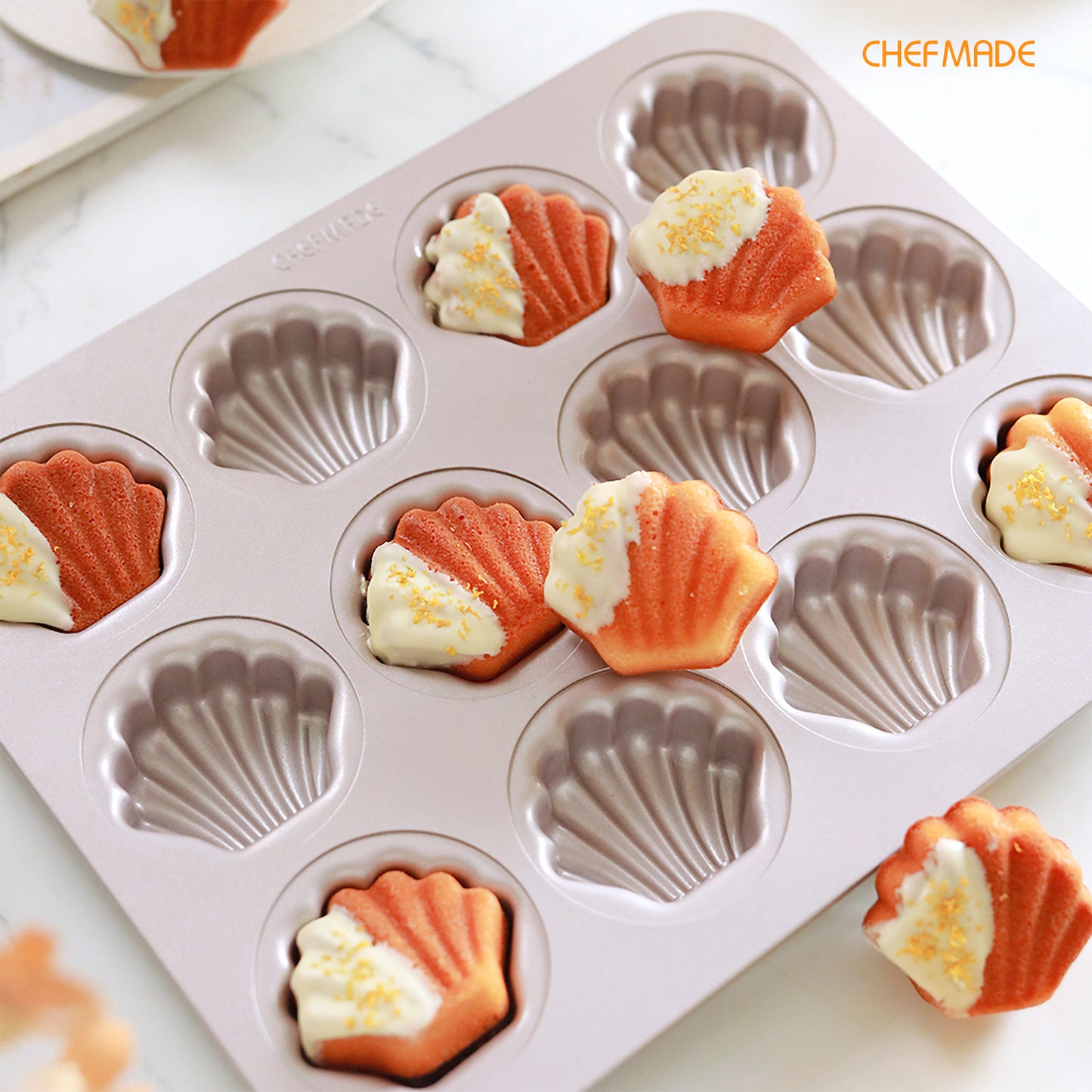 Madeline Cake Pan Oval Shell 12 Well