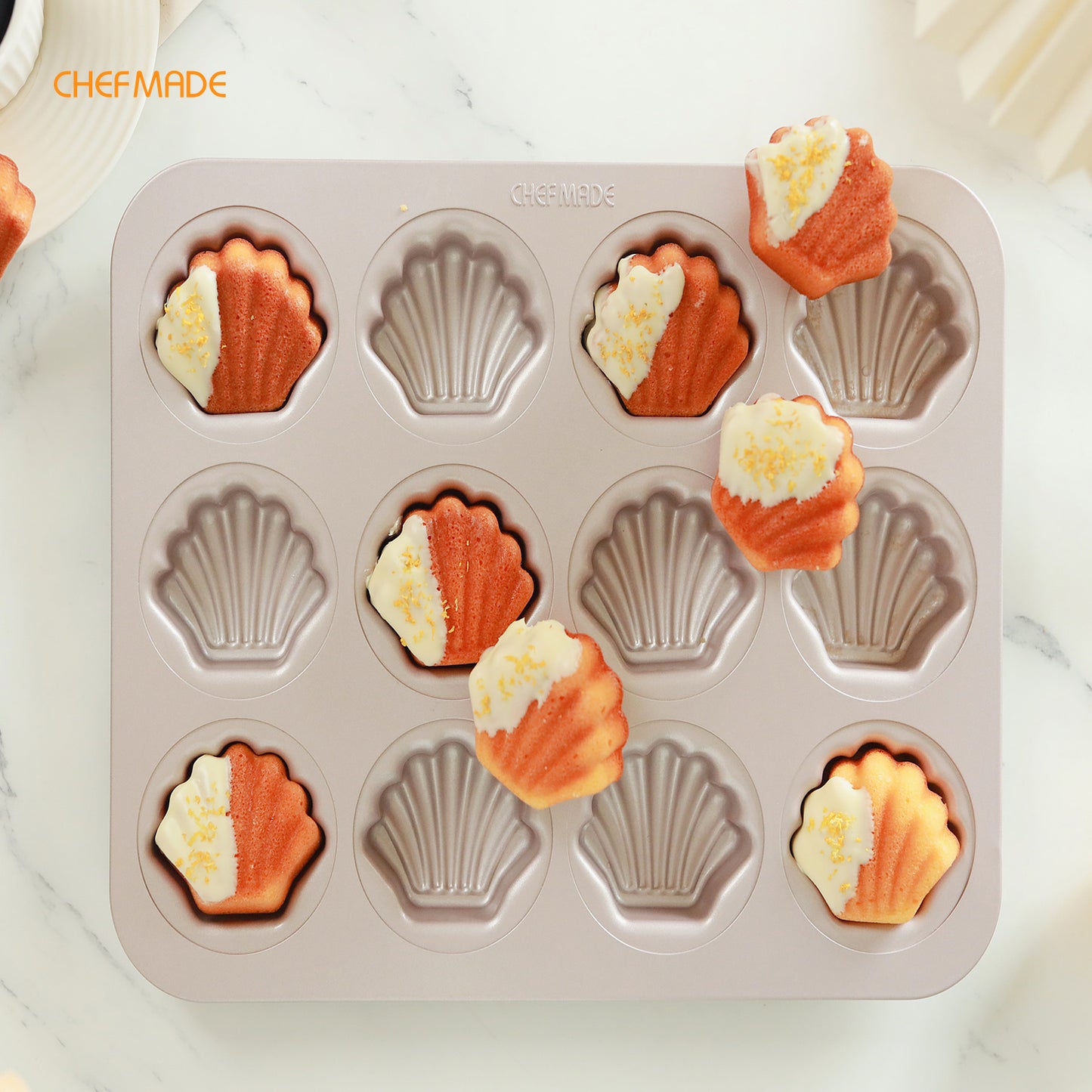 Madeline Cake Pan Oval Shell 12 Well